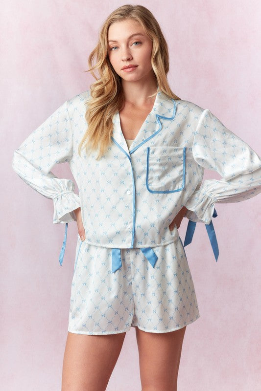 Satin Bow Prints With Contrast Piping &
Strap Cropped Shirt & Shorts Pajama Set