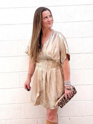 Hold metallic dress with dolman sleeves V neck lined with Pockets