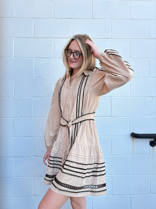 Tan and black Contrast Lace Trim Mini Dress! Featuring a collared neck, button placket, puff sleeves, and a flattering lace-trimmed belt. Get the perfect fit with smocked back detail and pintucks. Fully lined.