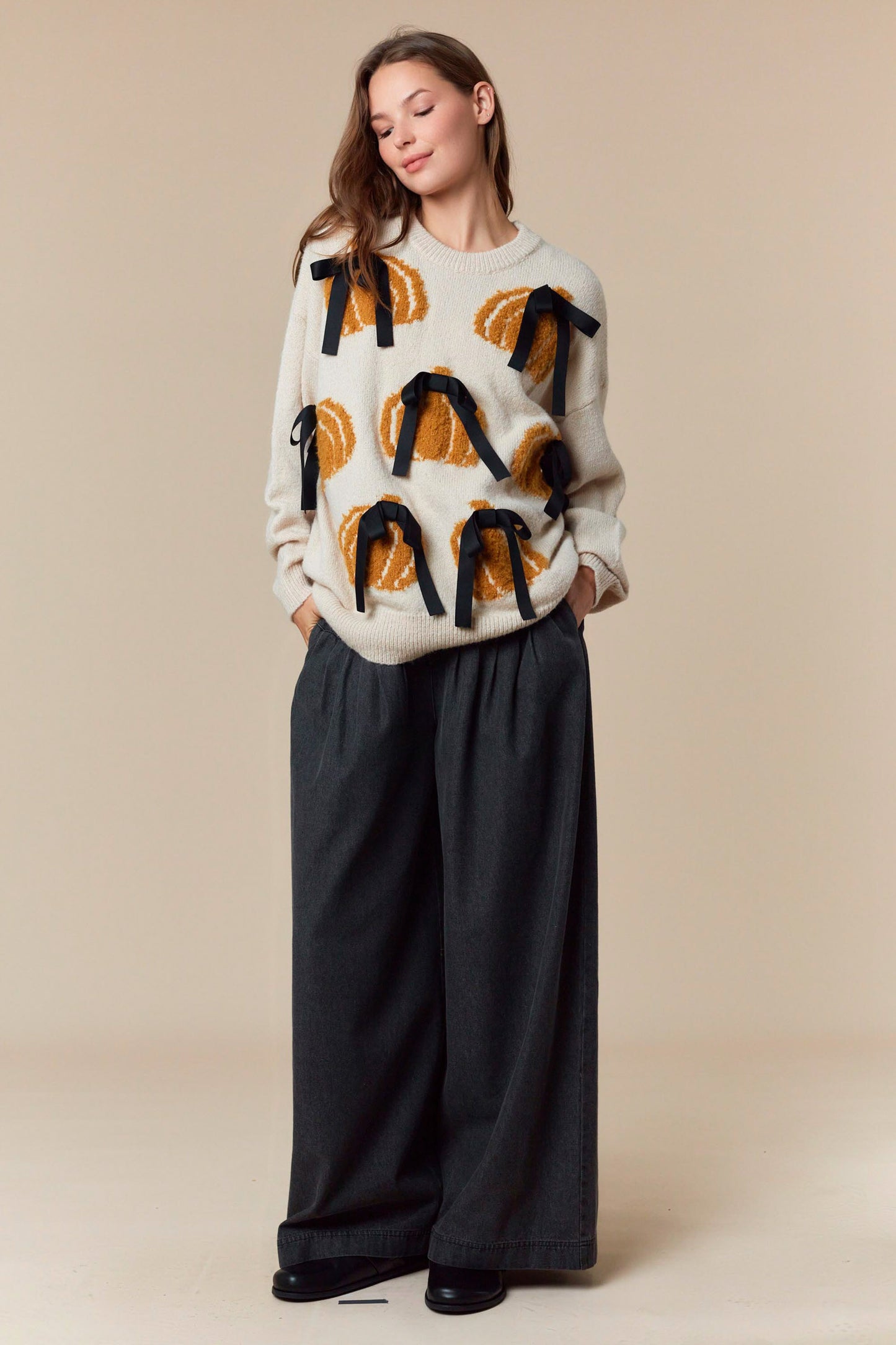 Cream pumpkin Bow sweater