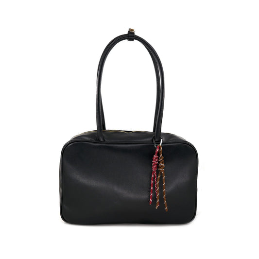 black boxy chic hand bag with charms
