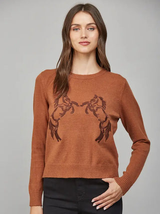 A timeless piece for the equestrian enthusiast. This classic crewneck sweater features a refined, detailed horse embroidery prominently displayed on the chest. Crafted for comfort and enduring style, its soft knit construction offers a flattering fit and easy layering. Perfect for chilly days at the stable or a cozy, distinguished weekend look.