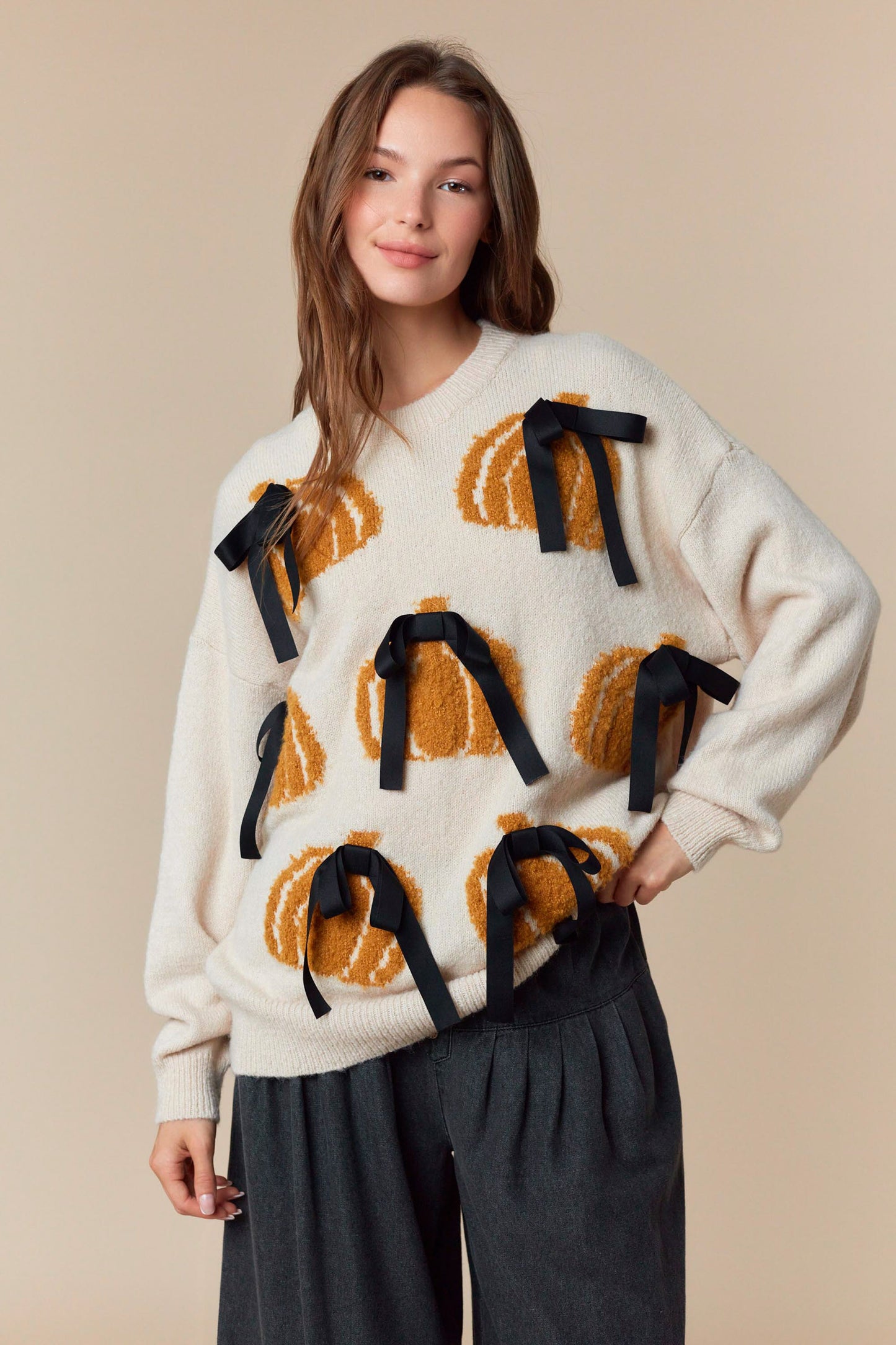 Cream pumpkin Bow sweater